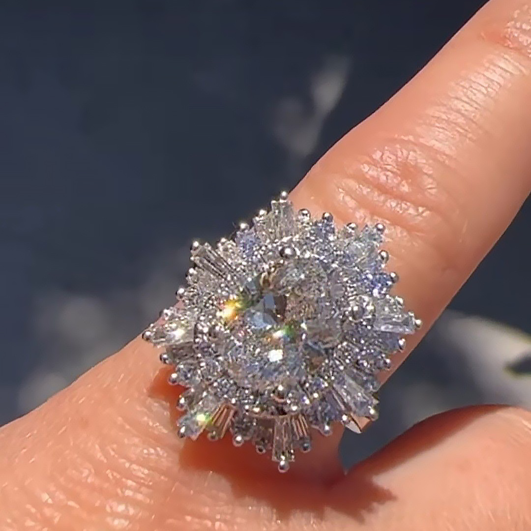 Custom Cushion-Cut Floral Burst Center Stone Engagement Ring With Special Baguette Stone Halo Deposit